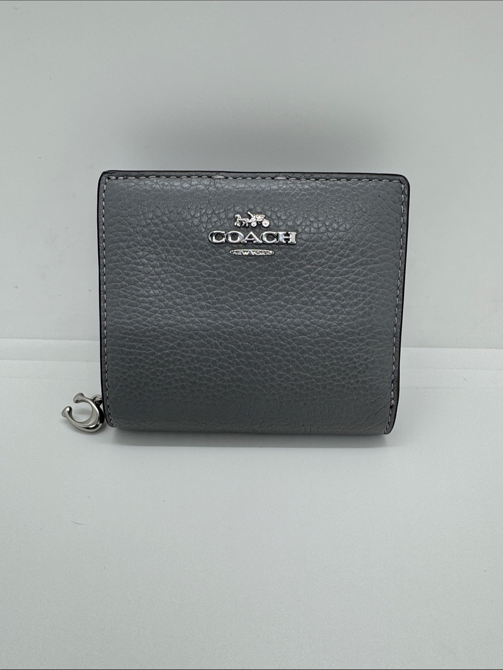 Coach Pebbled Leather Compact Wallet in Gray with Silver Hardware